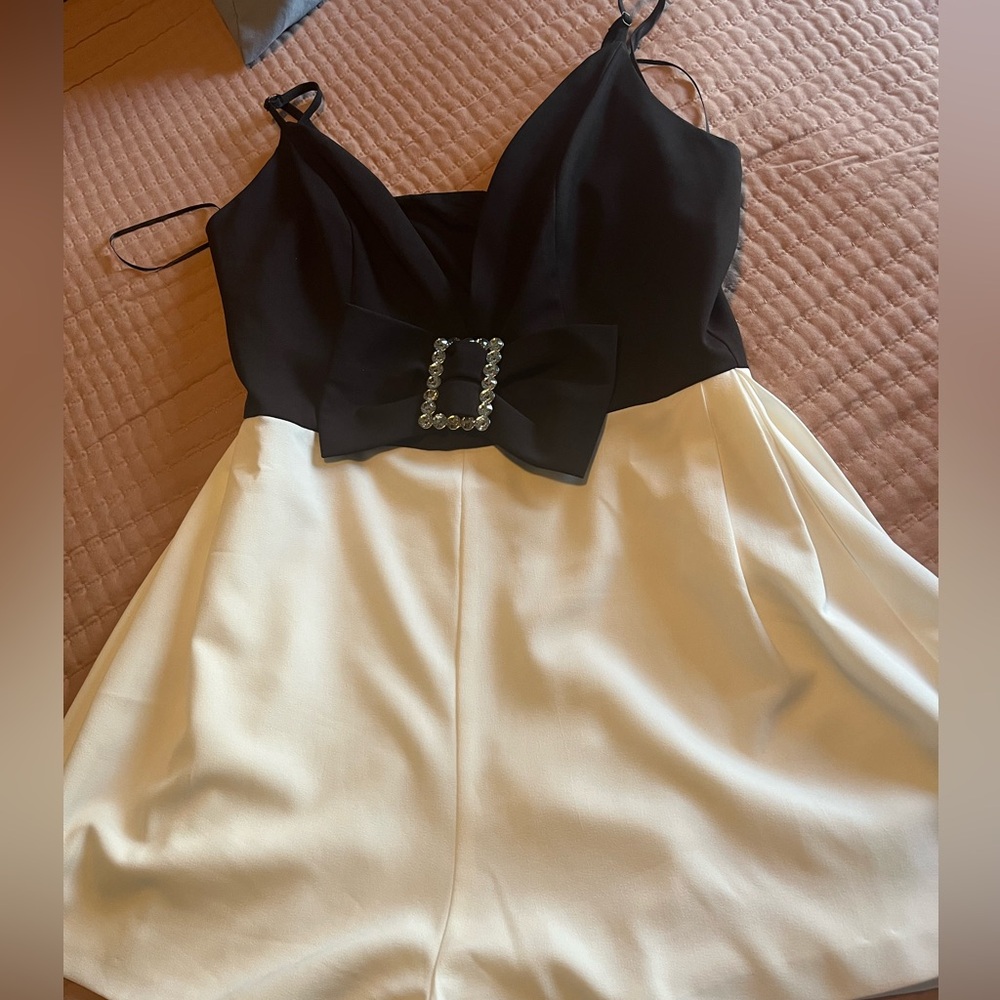 Elegant Black and White romper  with Bow Detail